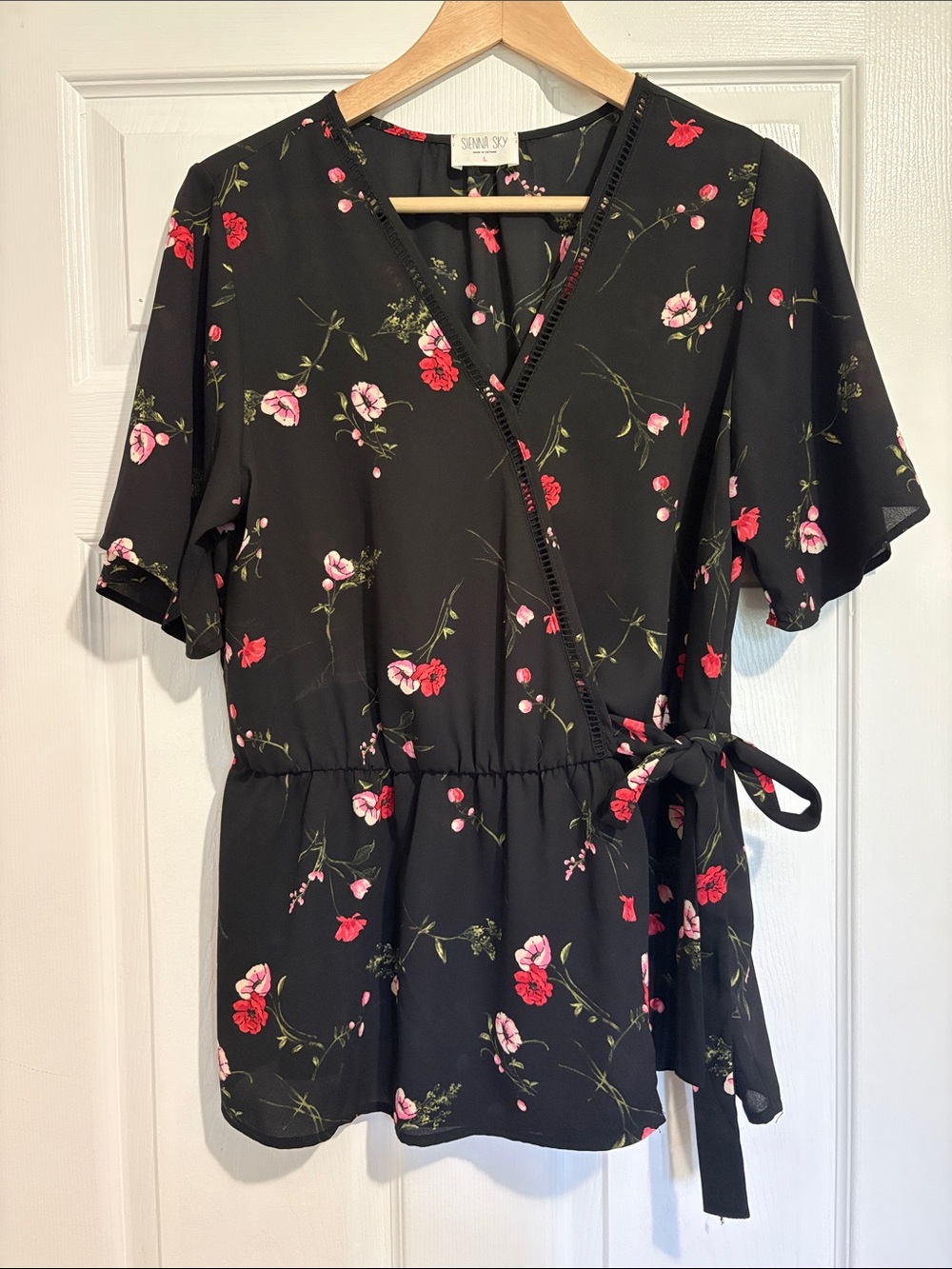 Sienna Sky Black Floral Wrap-Front Peplum Top